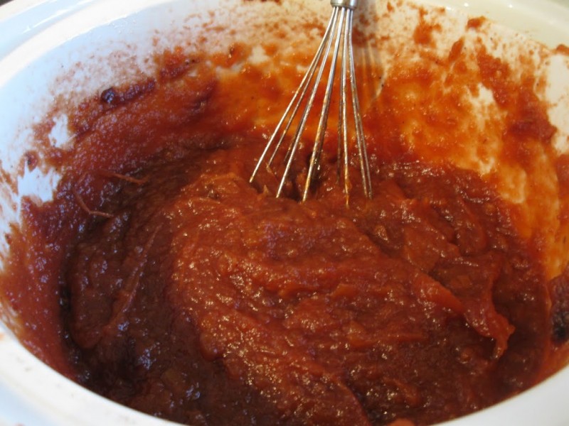 Smooth apple butter in a large crockpot.