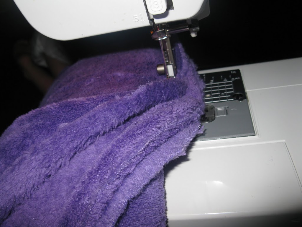 Yip Yip costume on sewing machine.