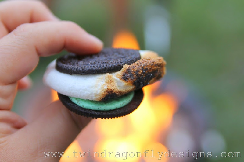 Mint S’moreo with mint oreo cookie stuffed with a cooked marshmallow.