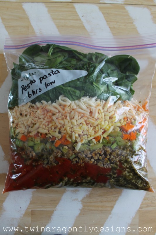 Freezer bag with ingredients for pesto pasta recipe.