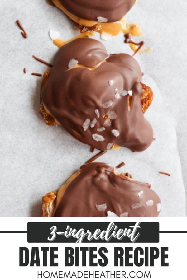 Three chocolate date bites are covered in a rich chocolate layer and sprinkled with sea salt, elegantly arranged on parchment paper. Text reads, 3-ingredient date bites recipe from homemedeheather.com.