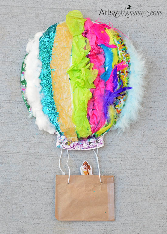 20+ Sensory Crafts for Kids A hot air balloon made from feathers, sparkles, tissue paper, and beads.
