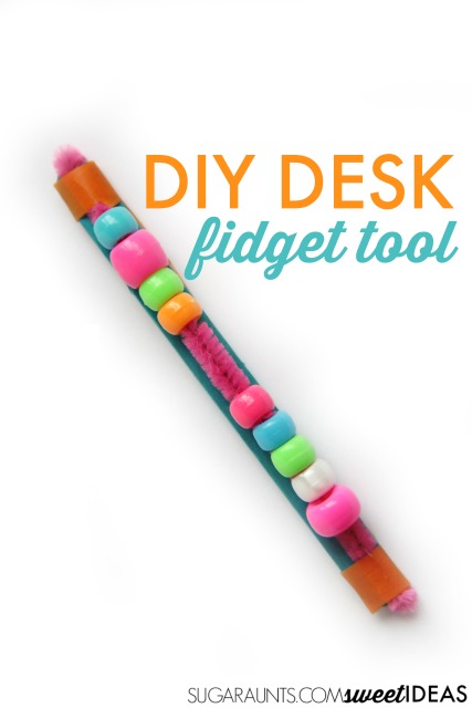 20+ Sensory Crafts for Kids Pony beads that slide and spin on a pipe cleaner.