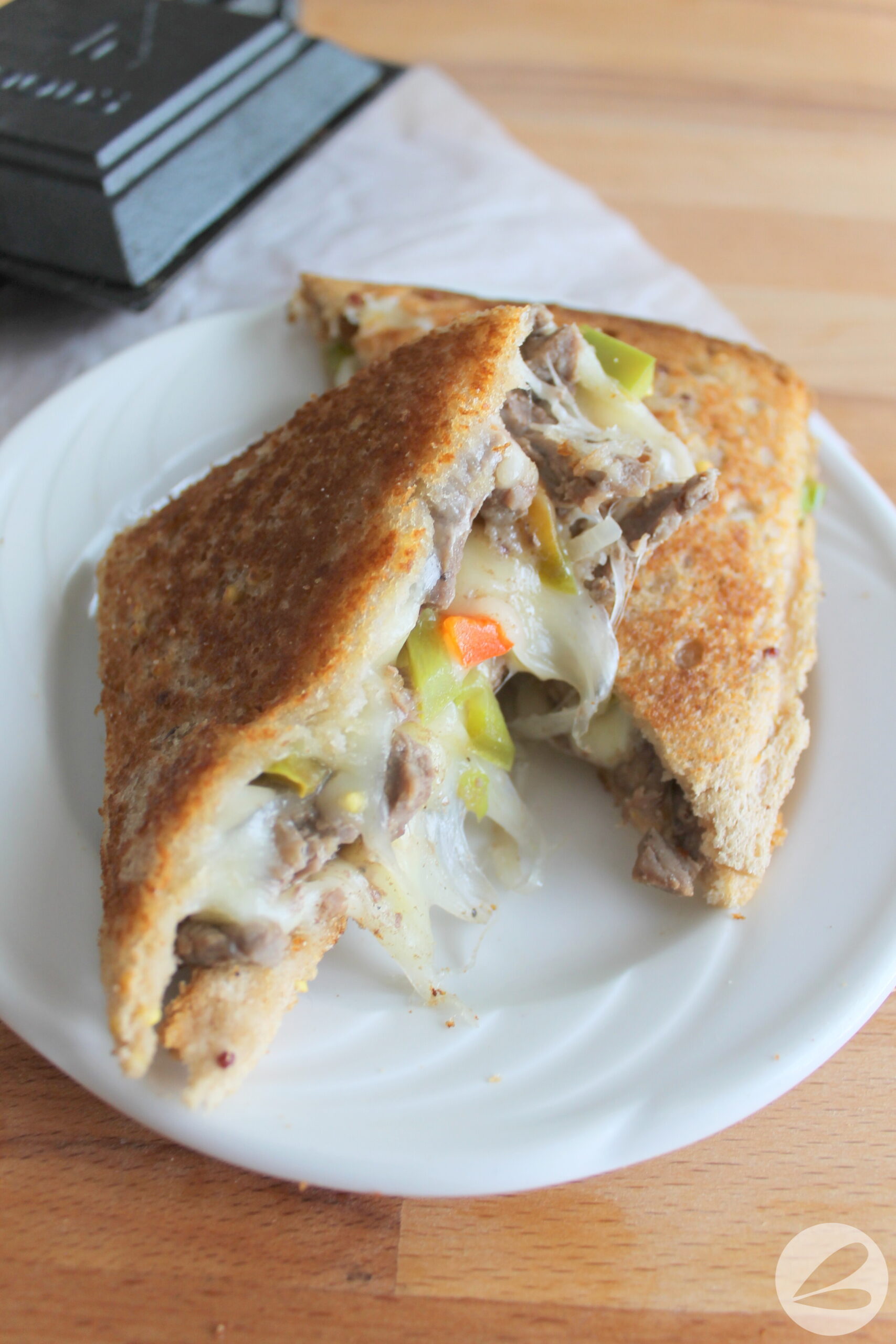 pie iron philly cheesesteak sandwich