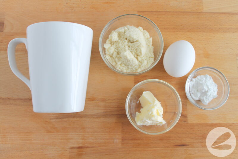 90 second mug bread ingredients in clear bowls.