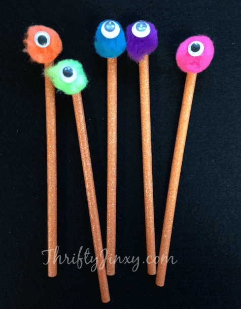 diy spooky monster pencils craft with googly eyes