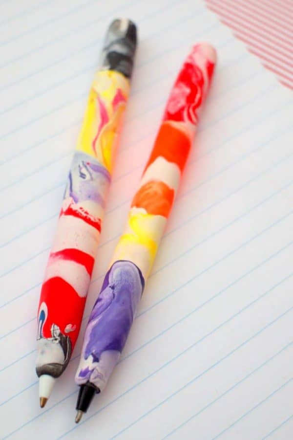 Pens covered with marbled clay.