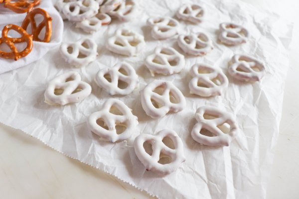 Pretzels covered in white chocolate.