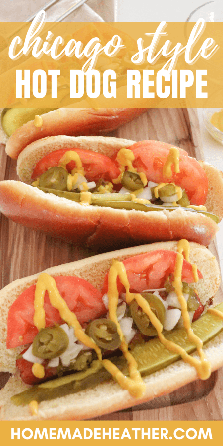 Three Chicago hot dogs topped with pickle spears, sliced tomatoes, diced onion, pickled peppers and mustard on a wooden cutting board with text overlay.