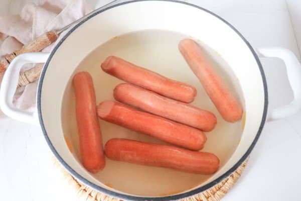 Boiled hot dogs in a dutch oven.