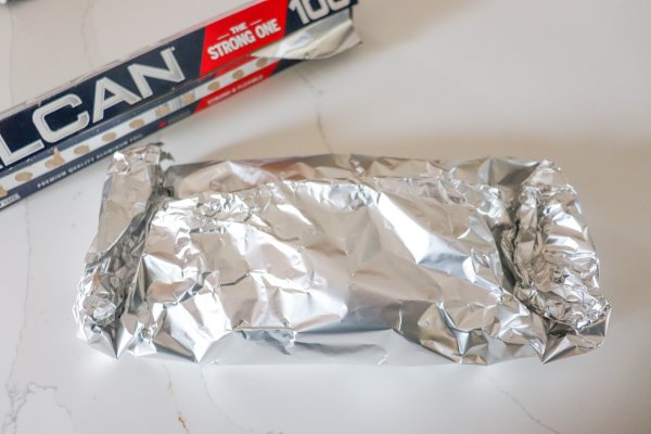 Potato and onion in a foil pack.