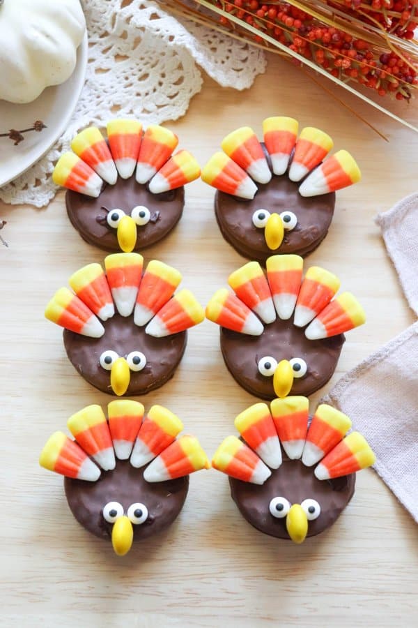 Nutter Butter Turkey Cookies on a wooden surface.