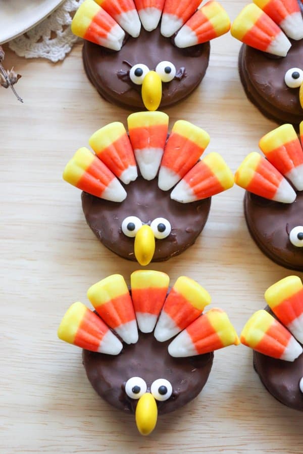 Nutter Butter Turkey Cookies with candy corn feathers and candy eyes.