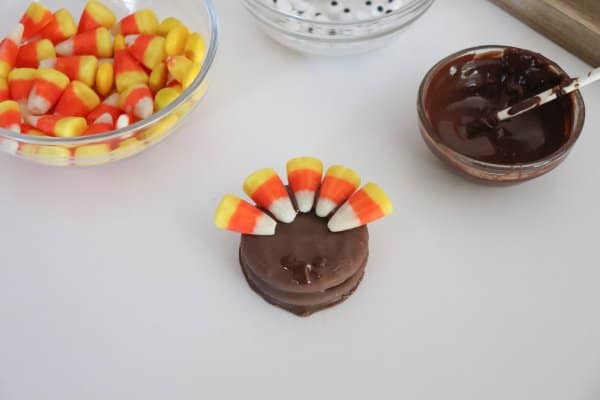 Nutter Butter cookie with candy corn on top.