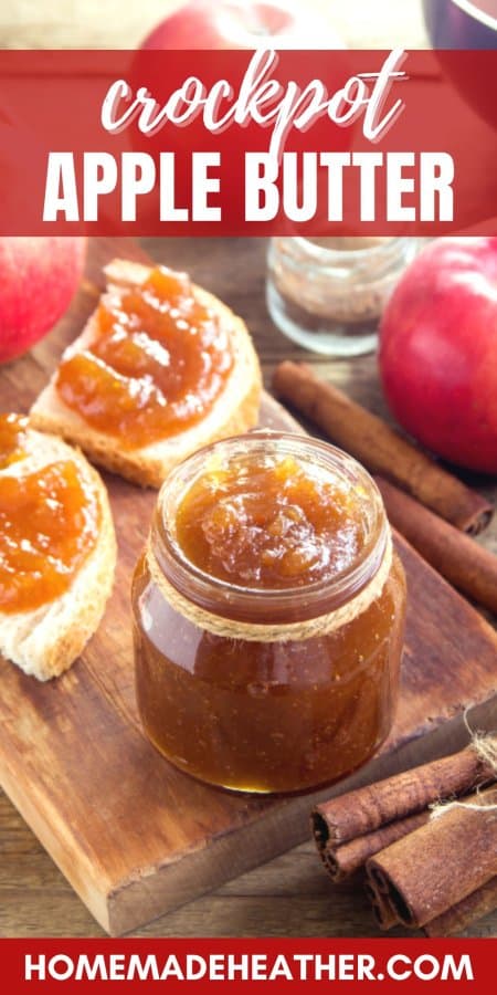 Crockpot apple butter recipe spread on toast, a jar of apple butter, and apples on a wooden surface.