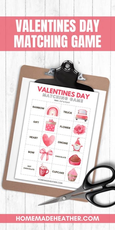 Valentine's Day matching game printable on a clipboard.