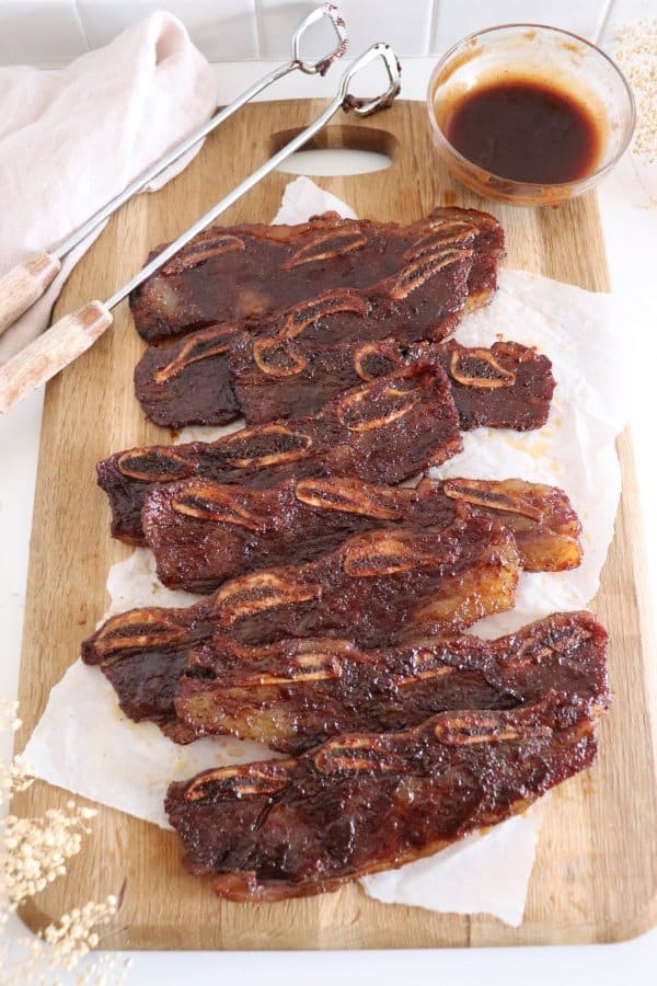Smoked short ribs on a board before serving.