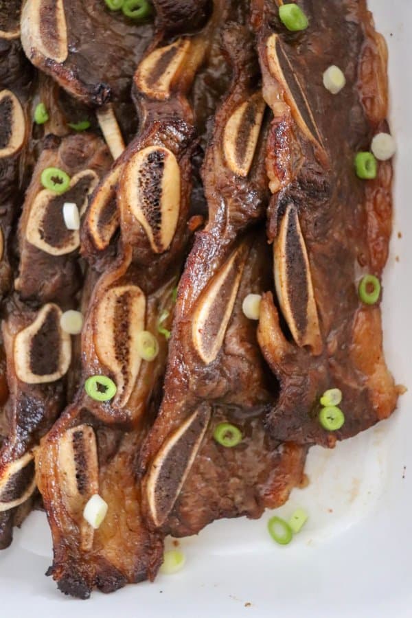 Short ribs that have been marinated and then put in the oven to bake.