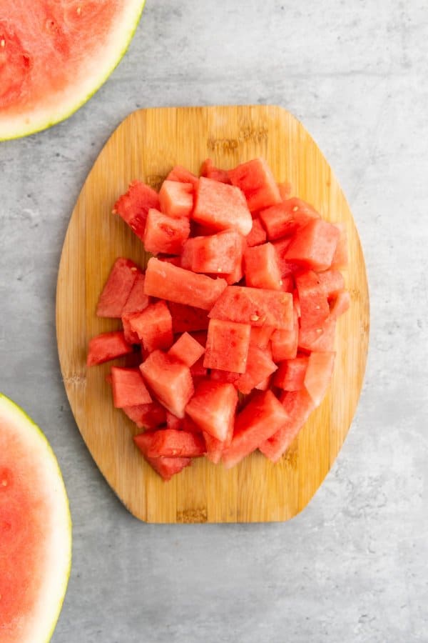 Watermelon cut up on cutting board