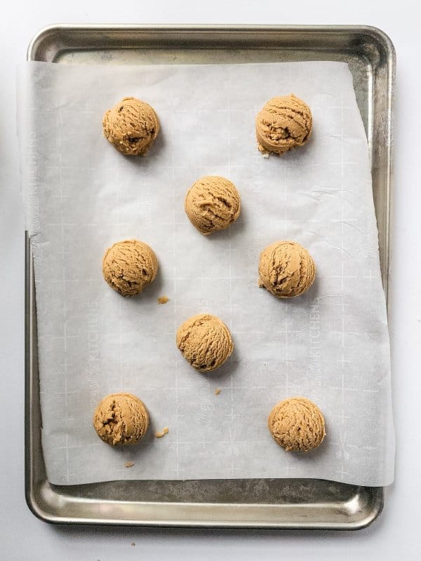 cookie dough balls of baking sheet