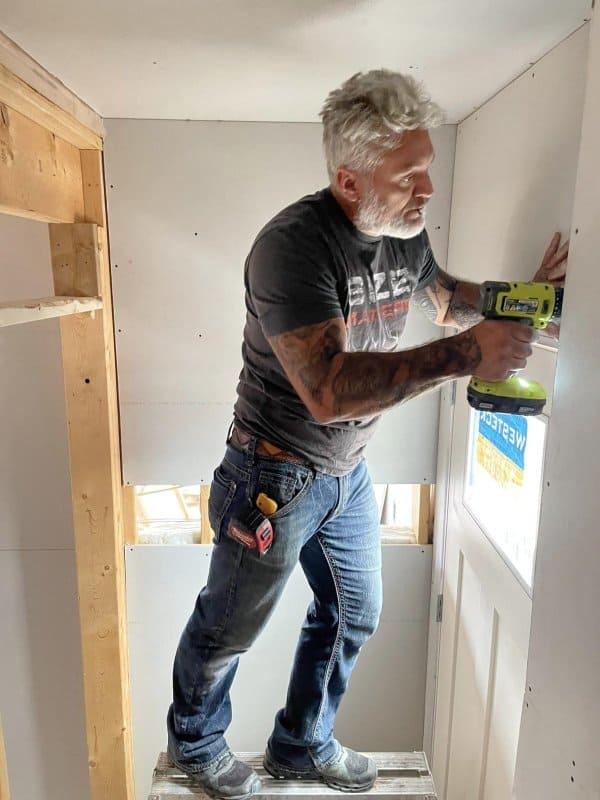 Martin installing drywall