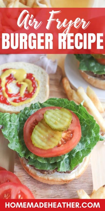 An air fryer burger recipe with lettuce, tomato, and pickles.