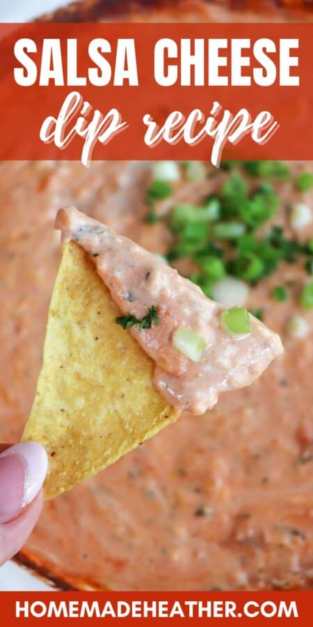 A tortilla chip with dip held in a hand over a dish of cheesy salsa dip topped with diced green onions with text overlay.