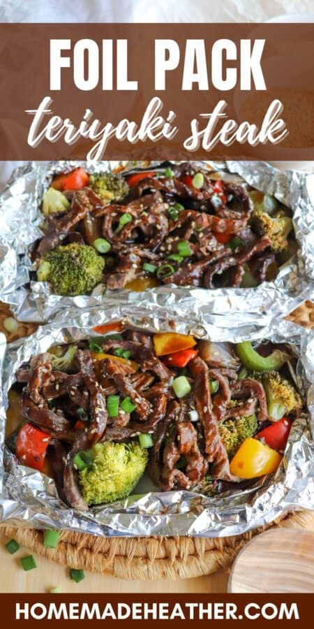 Steak on a bed of broccoli and diced bell peppers topped with teriyaki sauce, diced green onions and sesame seeds in a foil packet.