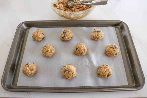 Kitchen Sink Cookie dough balls on cookie sheet