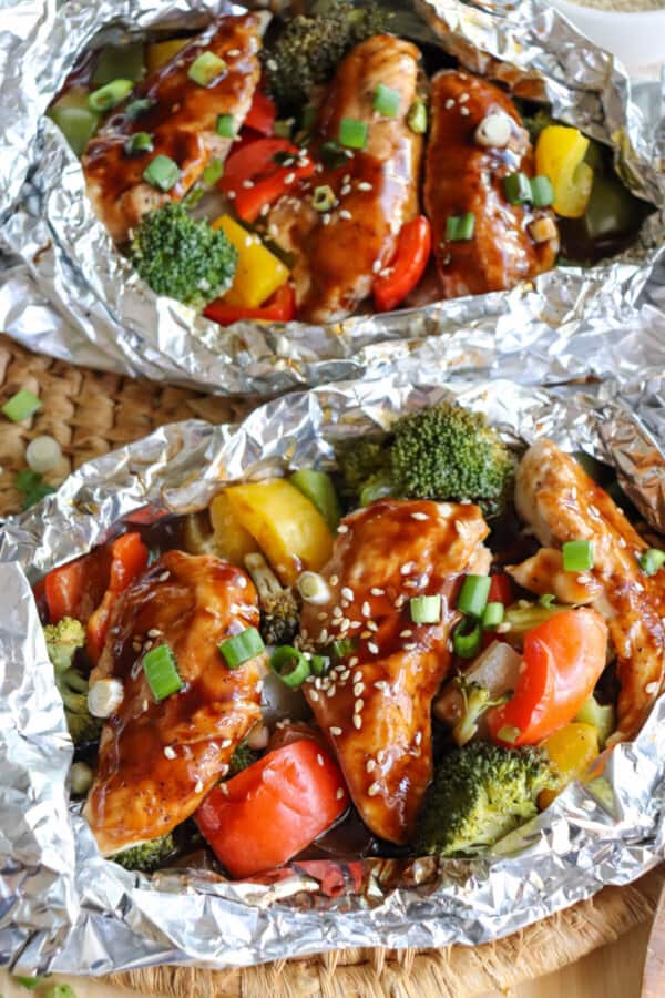 Teriyaki chicken and vegetables in a foil packet.