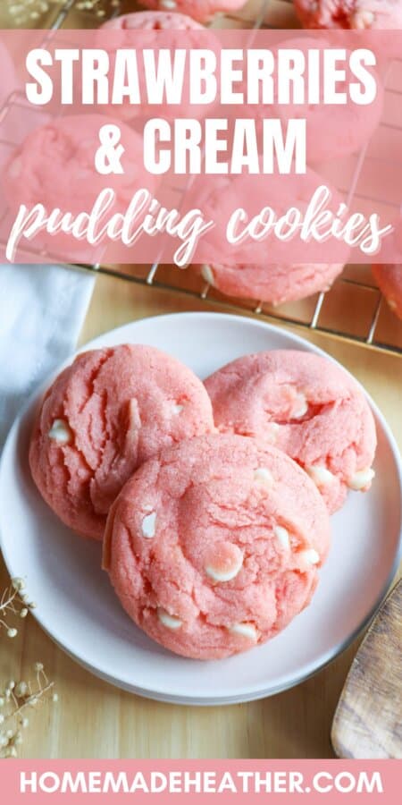 Pink cookies with white chocolate chips on a white plate.