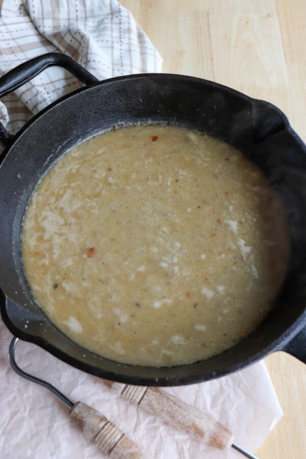 Cast iron skillet with chicken broth roux.
