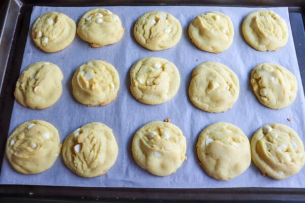 Lemon cookies baked on a cookie sheet.