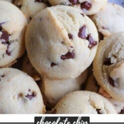 Chocolate chip cookies piled on top of each other.
