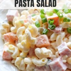 Ham & cheese pasta salad in a white bowl.