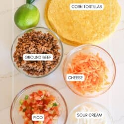 Ingredients for air fryer tao bake in clear glass bowls on a white counter.