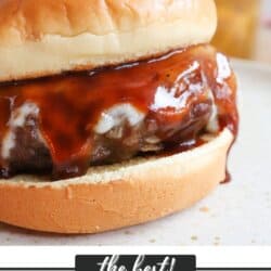 BBQ hamburger with bbq sauce and cheese.