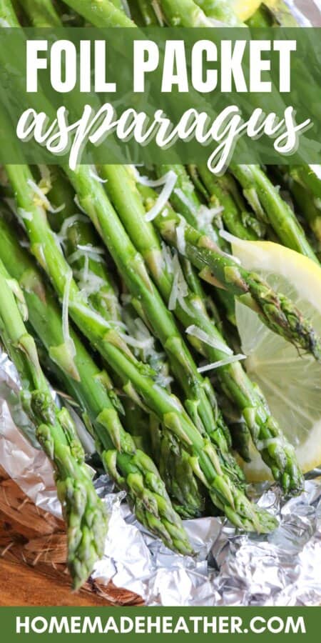 Asparagus spears topped with lemon slices and shredded mozzarella in a foil packet.