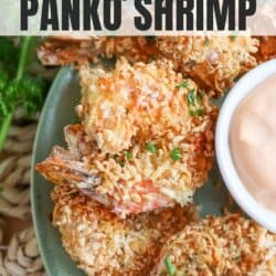 Close up of air fried panko shrimp on a green plate.