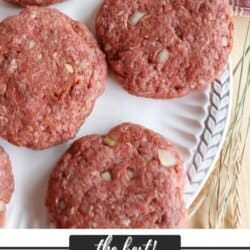 Hamburger patties on a white plate.