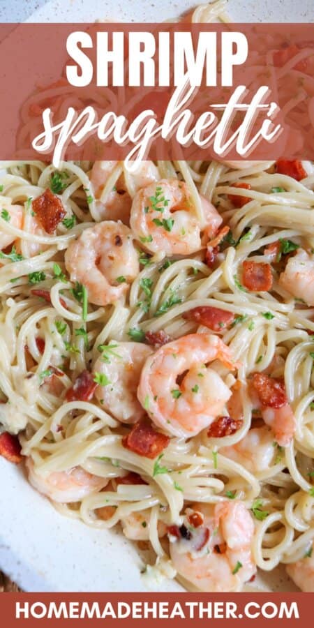 Spaghetti noodles in creamy white sauce with cooked shrimp, bacon bits and fresh parsley.