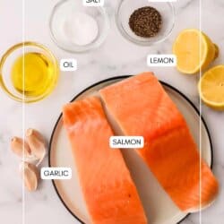 Baked salmon bite ingredients in clear glass bowls on a white counter.
