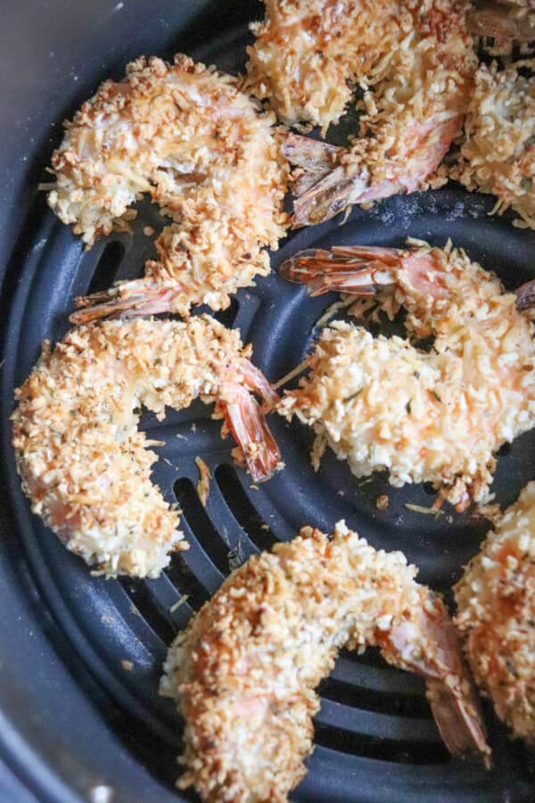 Close up of air fried panko shrimp in the air fryer.