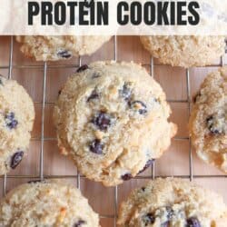 Chocolate chip cookies made with almond flour and cottage cheese on a wire rack.