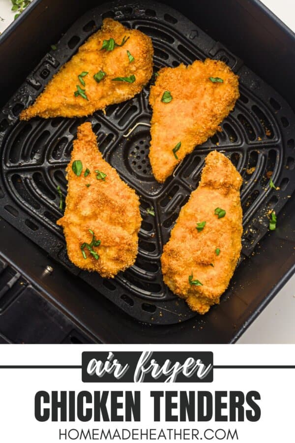 Breaded chicken strips in the basket of an air fryer.