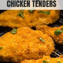 Breaded chicken strips in the basket of an air fryer.