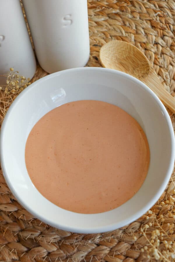 Spicy mayo sauce in a white bowl.