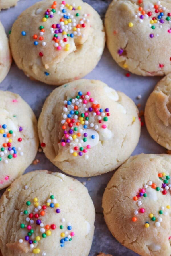 White pudding cookies with rainbow sprinkles.
