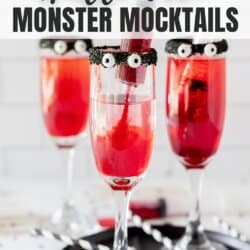 Champagne glasses with black frosting on the rim, candy eyes and sprite died red with a syringe full of food grenadine.