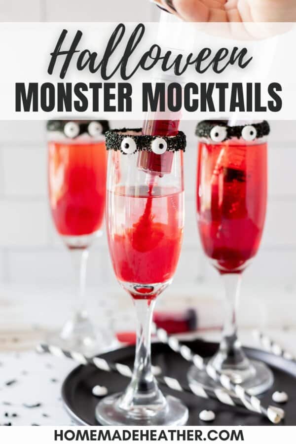 Champagne glasses with black frosting on the rim, candy eyes and sprite died red with a syringe full of food grenadine.